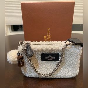 Coach Nolita Mini Shearling Wristlet, new without tags